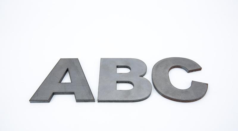 Laser cut hot roll steel letters of the alphabet