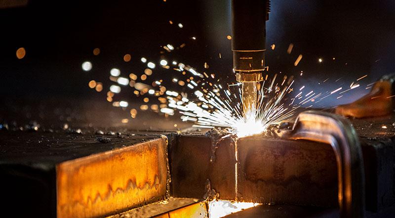 Coremark Metals offers steel plate flame cutting services. Steel plate cut to custom sizes.