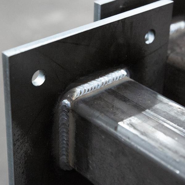 https://www.coremarkmetals.com/files/image/medium/square base plate with holes welded to steel tube