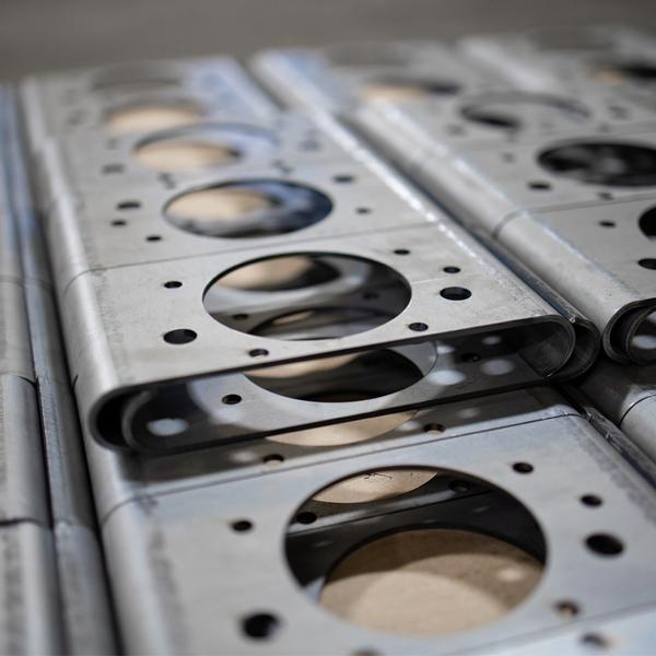 https://www.coremarkmetals.com/files/image/medium/laser cut and formed custom metal parts on pallet