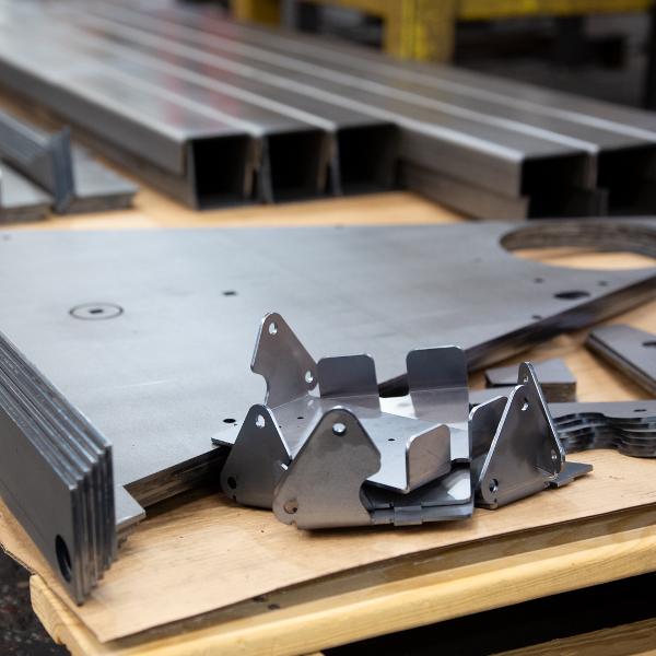 https://www.coremarkmetals.com/files/image/medium/custom steel laser cut and formed parts